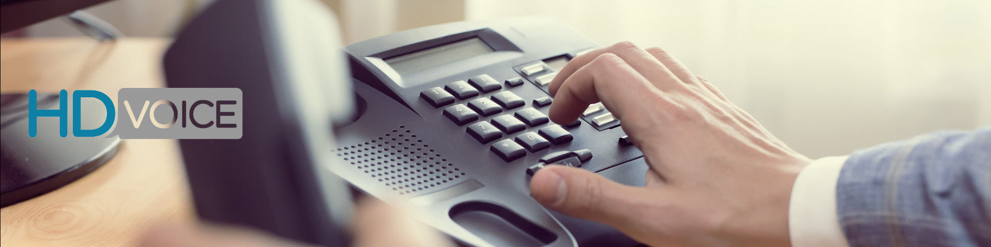 hdvoicecopy person dialing telephone